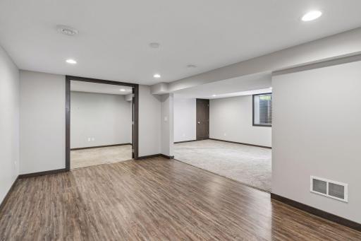 At the opposite end of the recreation space is an office, den, or even a nice storage room.