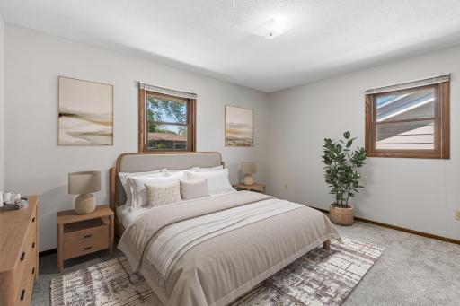 The primary bedroom is large enough for a king-size bed and offers views to the front and side. New carpet in this bedroom.