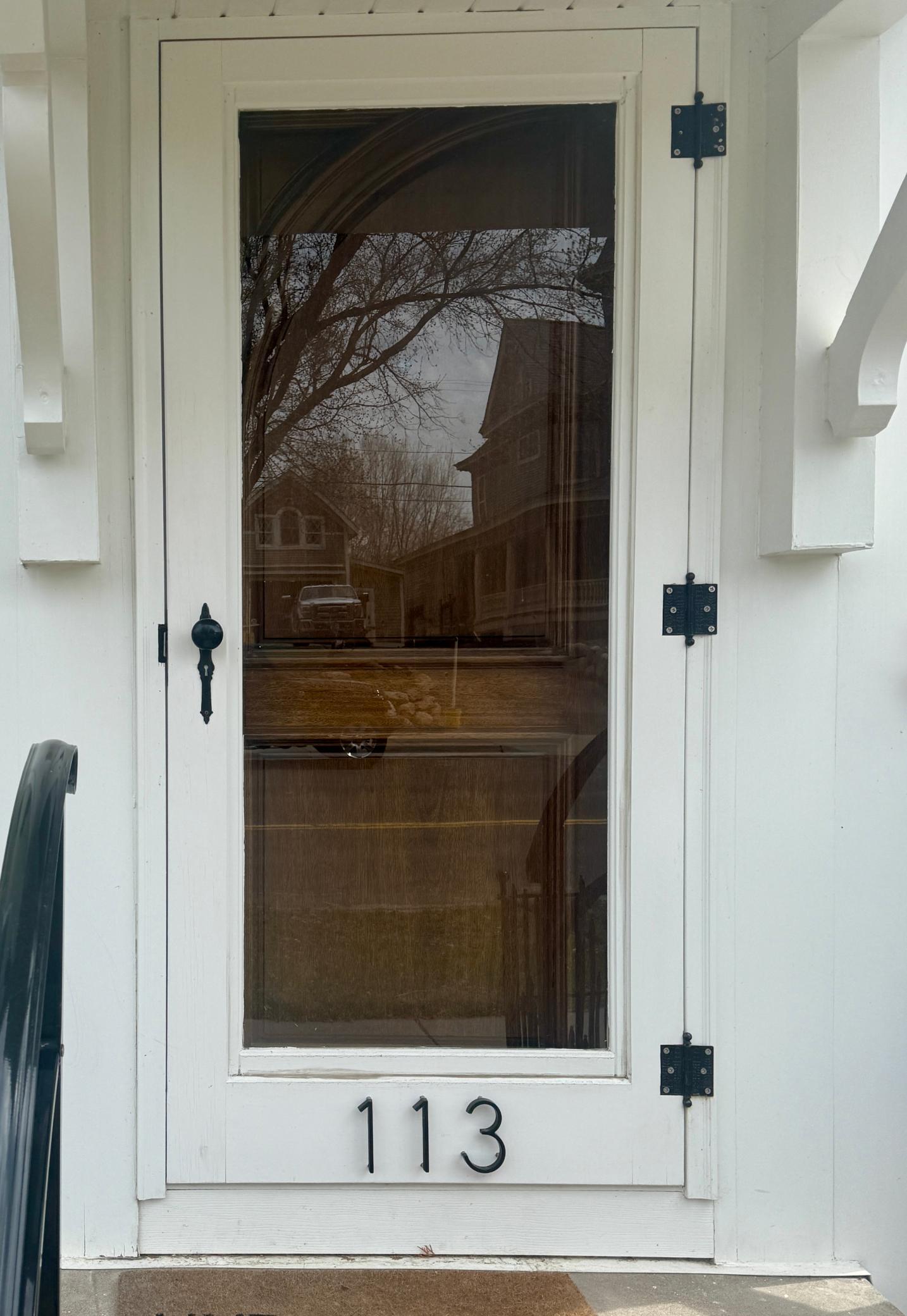 New front door and antique storm door to match the historic charm