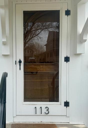 New front door and antique storm door to match the historic charm