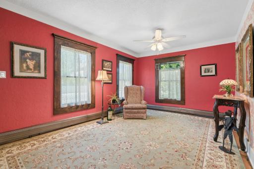 Front living room features new windows and window trim.