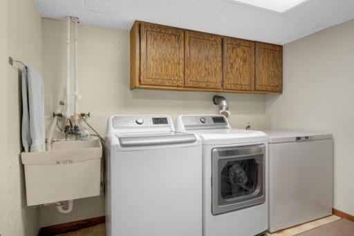 Lower level laundry room. Washer and dryer replaced (2023). Freezer included in the sale.