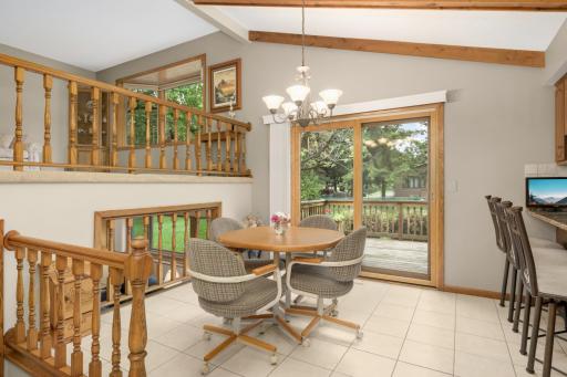 Dining area with patio door to deck/patio/back yard