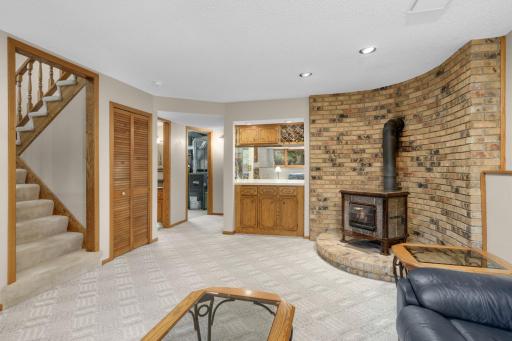 Lower level family room features custom built-ins