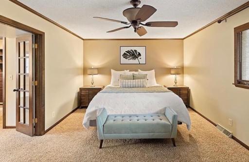 Primary bedroom with a huge private bathroom and walk in closet.