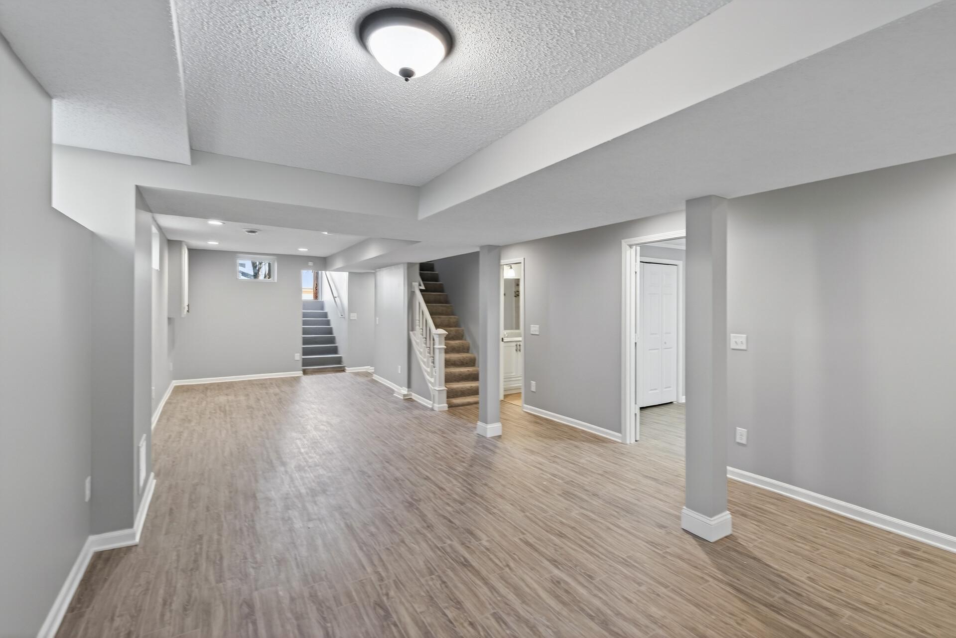 Walkout Lower Level with Brand New Flooring & Noise-Cancelling Ceiling