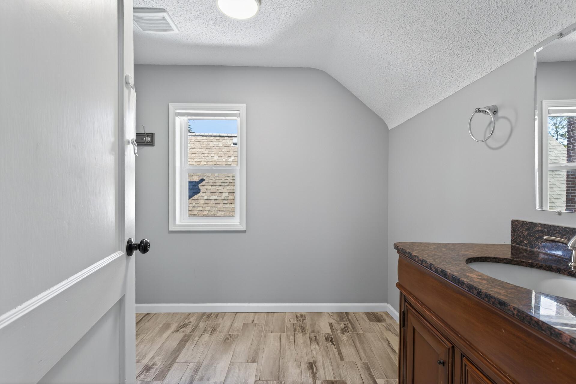 Upper Level Bathroom (Space for another washer & dryer)