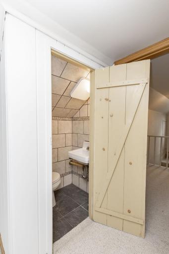 Upper Level Half Bath- en suite to bedroom 3