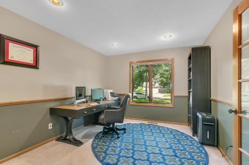 Office space just off the main area has french doors. This could be a fifth bedroom!