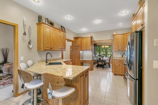 Granite counters and a breakfast peninsula for easy dining.