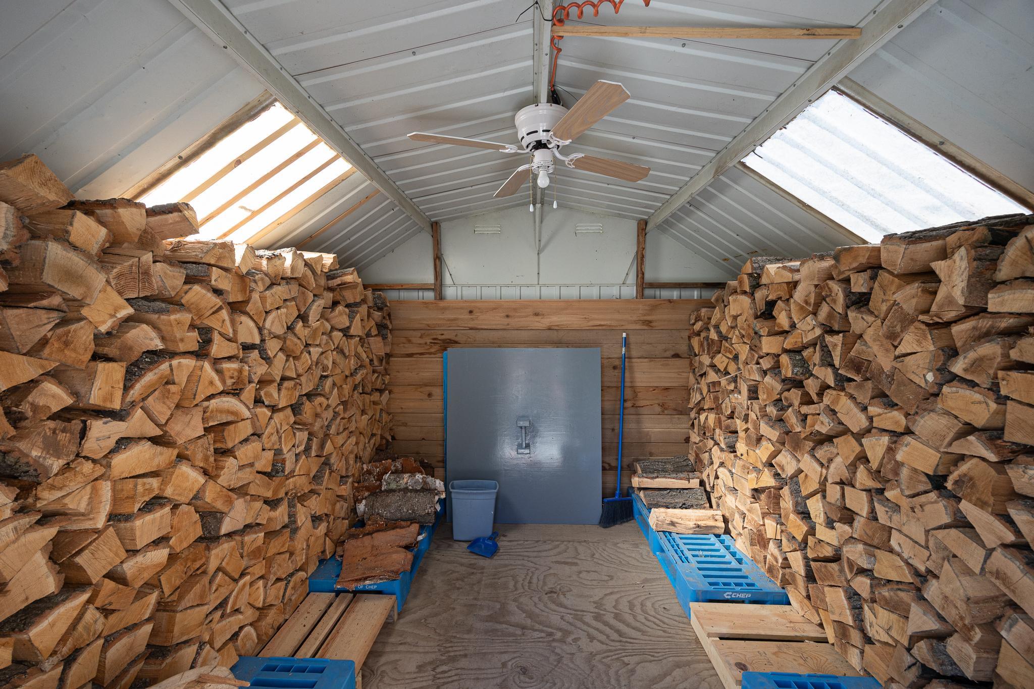 Interior of wood shed with dryer