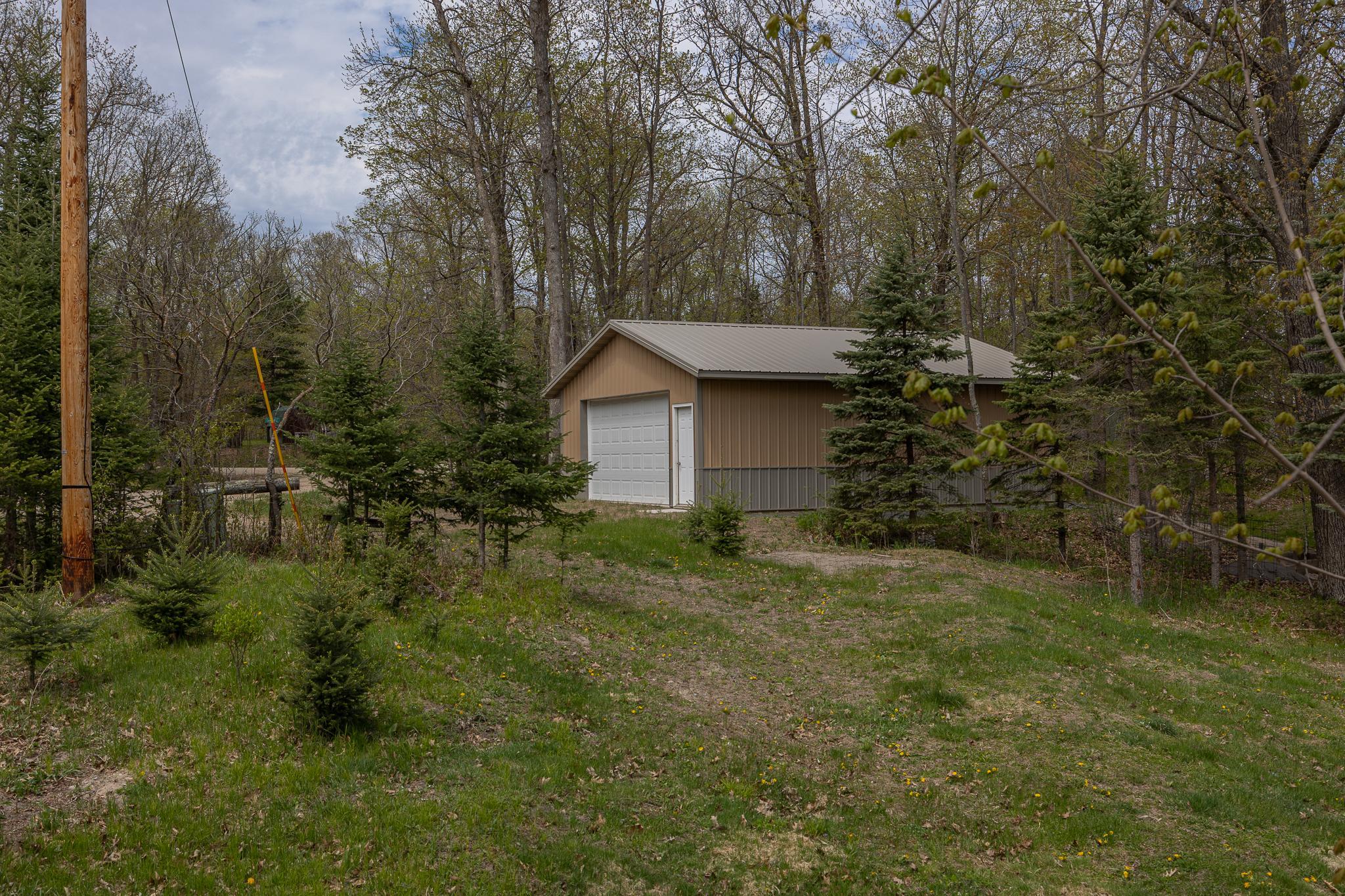 Large back lot with large garage