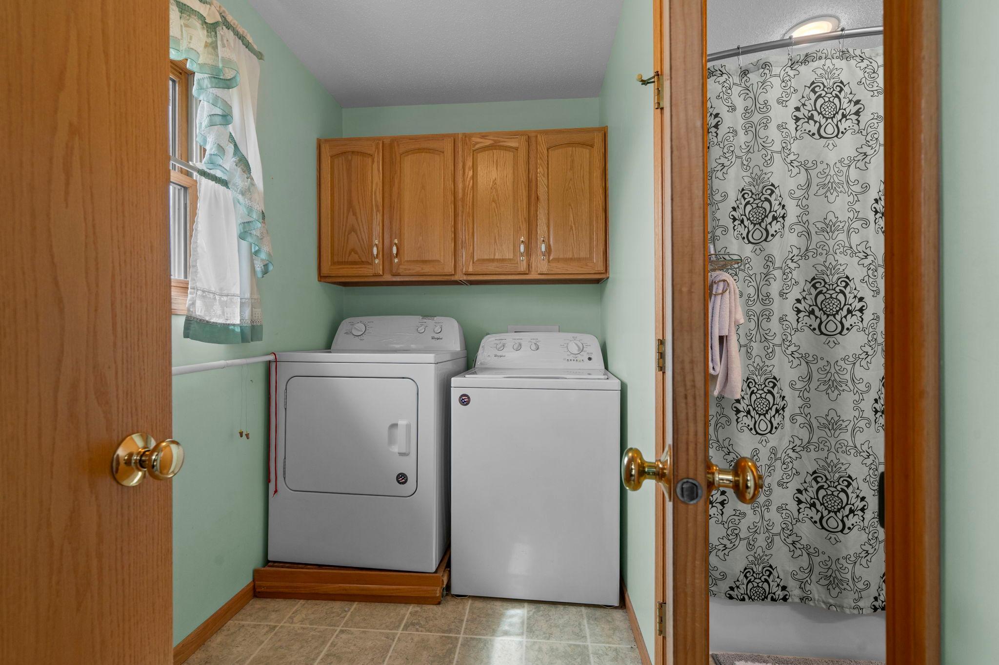 Main floor laundry room; has electric dryer and also LP gas dryer hookup