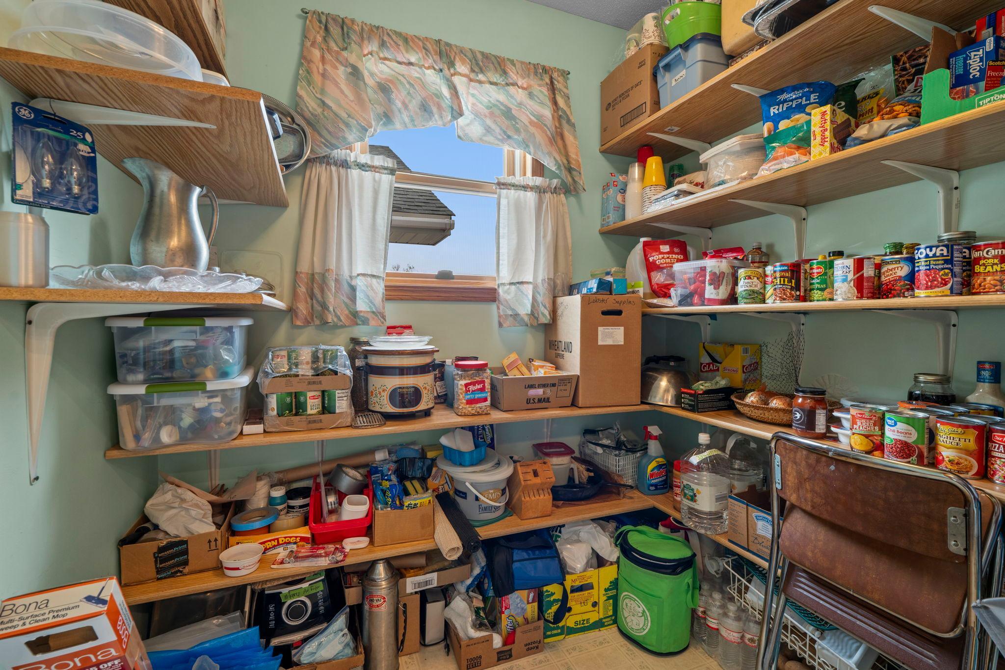 Walk-in pantry with plenty of additional storage space