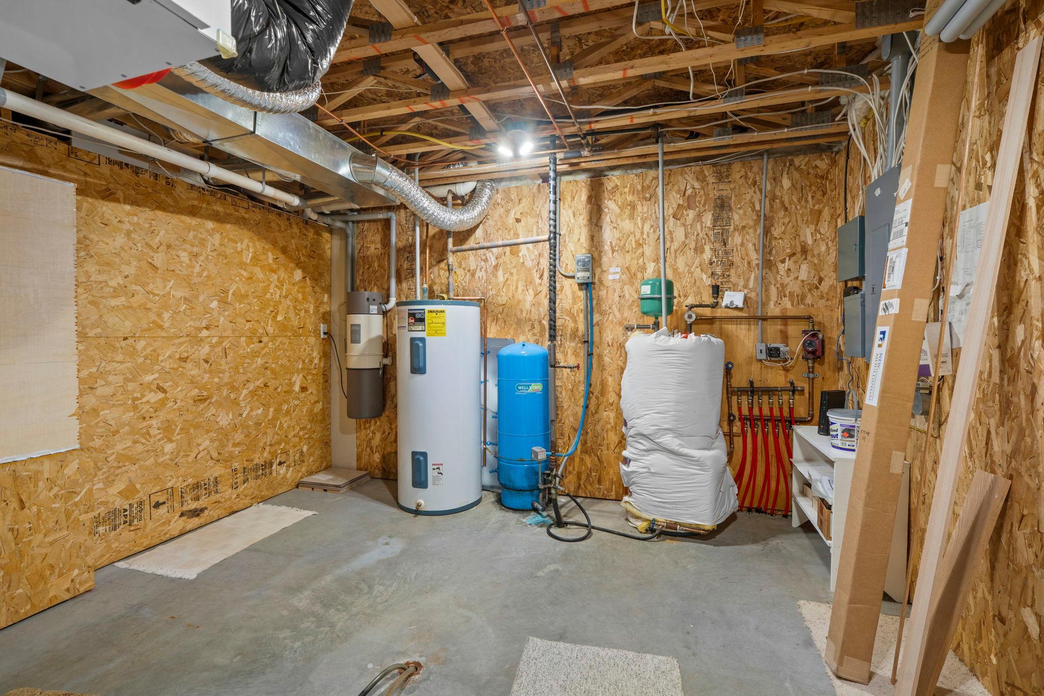 Hydronic in-floor heat, powered with separate electric water heater