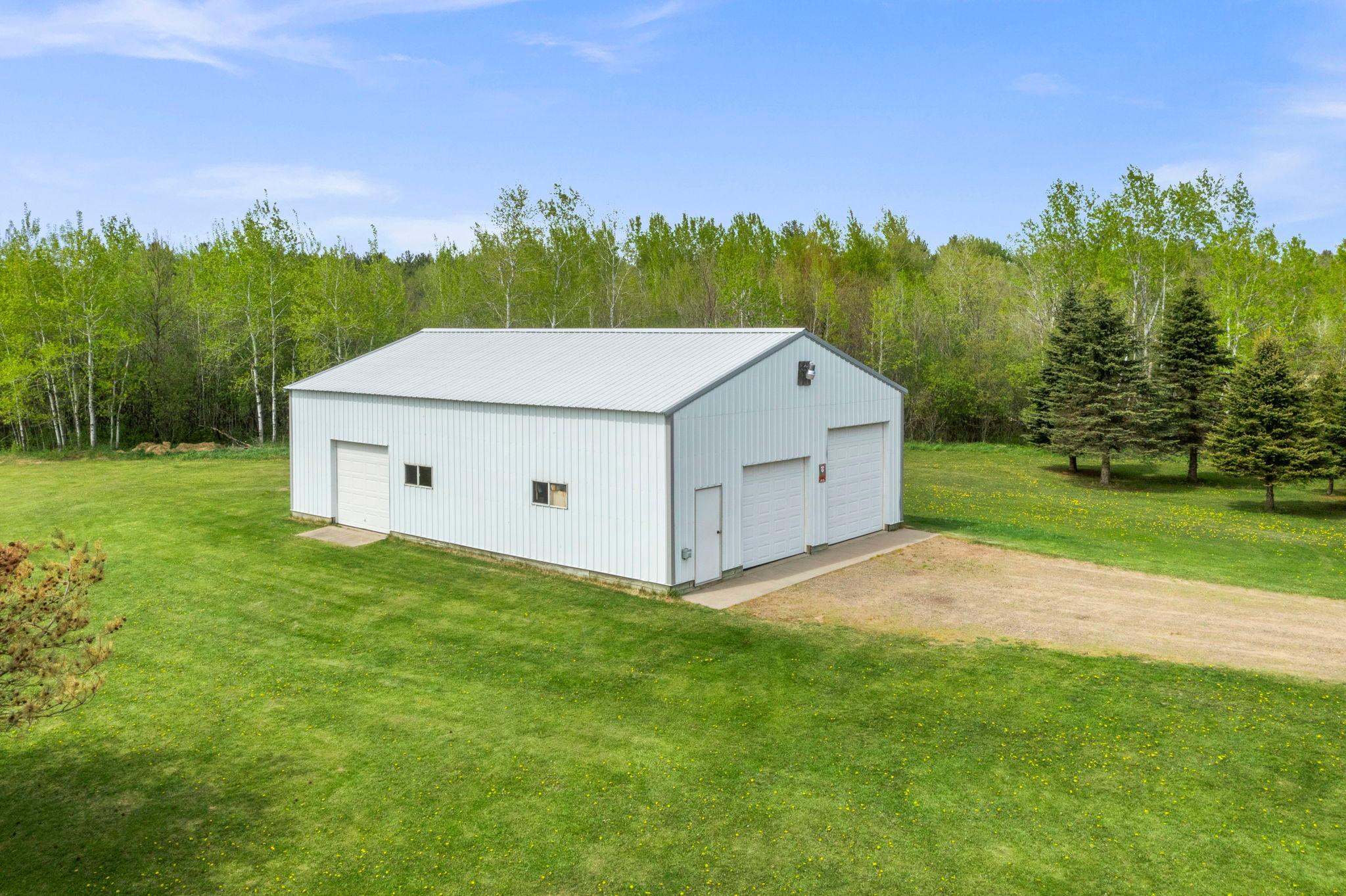 23'x13' room with insulated floor, walls, ceiling, overhead door