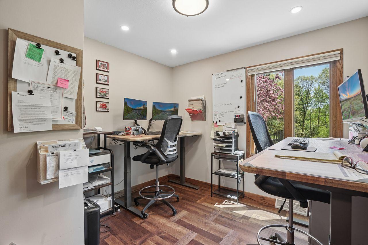 Third main level bedroom is currently used as a home office