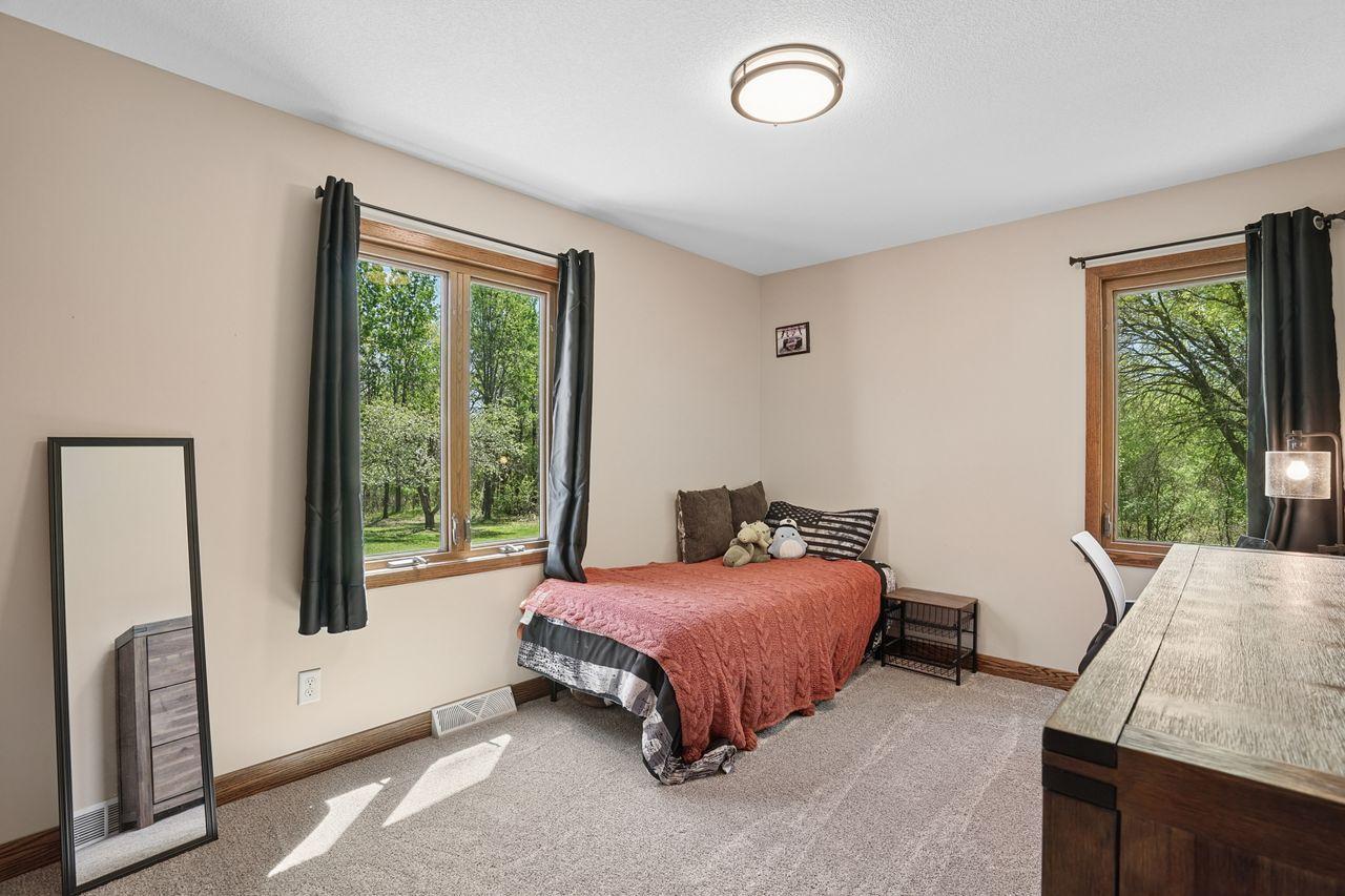 Spacious second bedroom on the main level with double windows