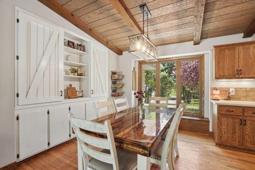Another wonderful view with extra tall triple windows that seem to allow the outside in. Sunday morning brunch anyone?