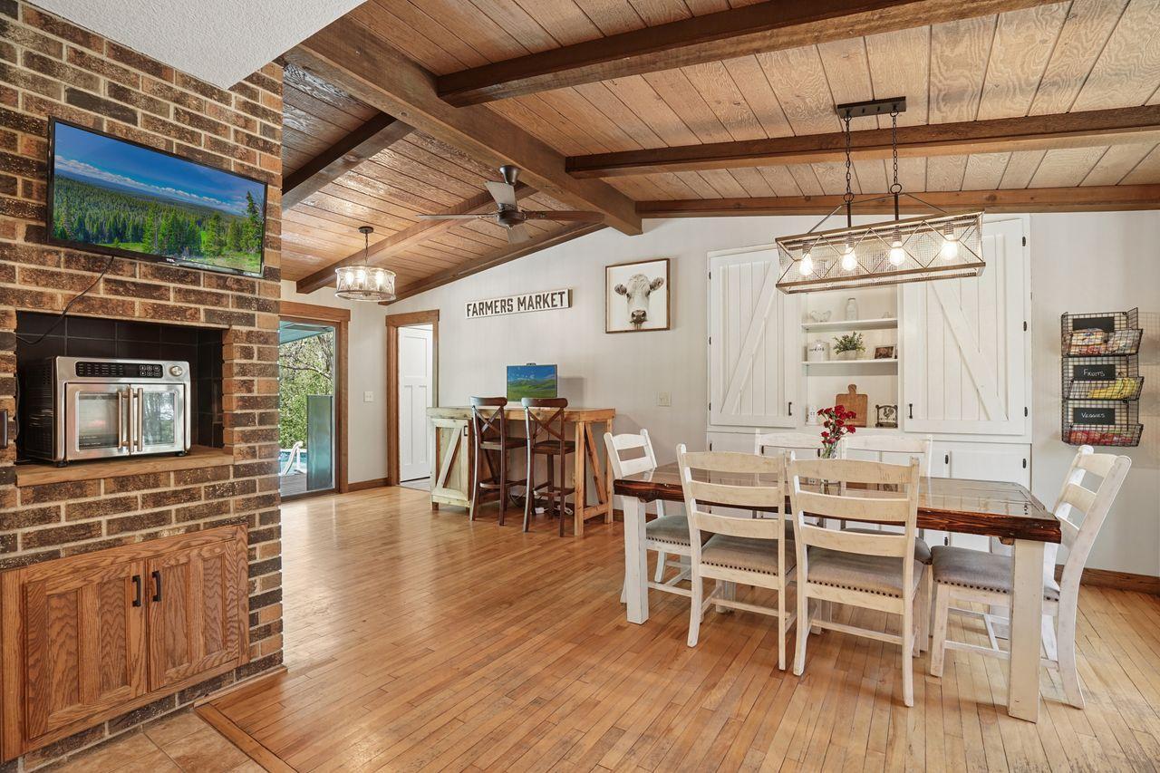 Separate, yet open dining room is absolutely perfect for hosting holidays, birthdays, game nights and gatherings. The charming custom built-in hutch adds character and extra storage space.