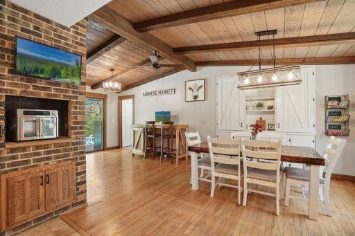 Separate, yet open dining room is absolutely perfect for hosting holidays, birthdays, game nights and gatherings. The charming custom built-in hutch adds character and extra storage space.