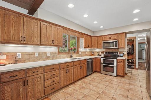 Bright, open layout and a kitchen designed for both everyday living and entertaining. Window above the sink allows natural light to flow in with a picturesque view of the front yard.