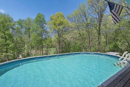 Refreshing above ground pool has a newer heater offers hours of entertainment.