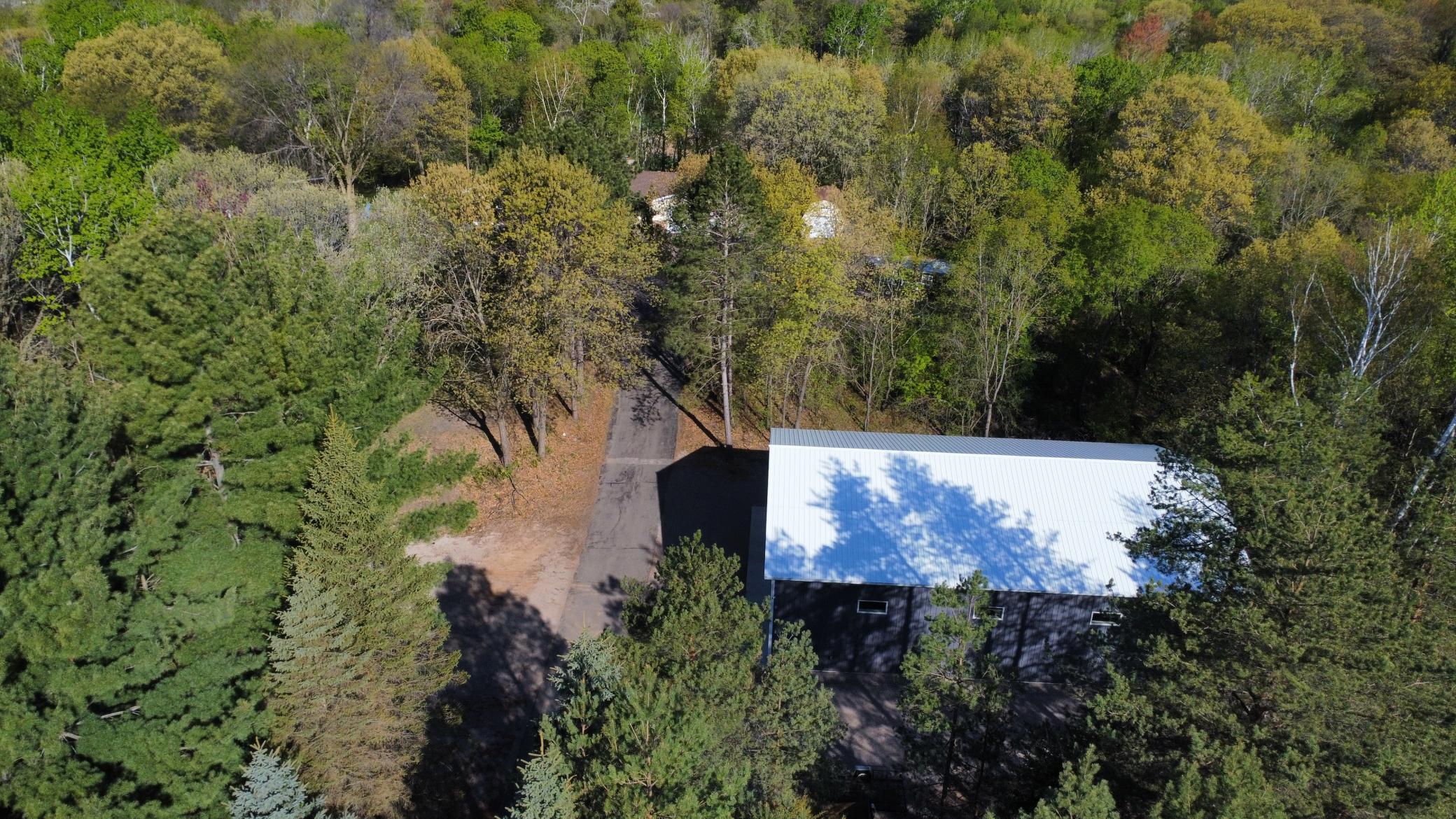 Driveway to shop on R and house set back.jpg