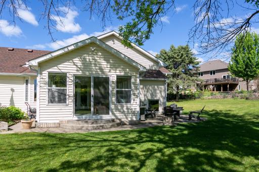 Side view of 3-season porch, sliding door and patio