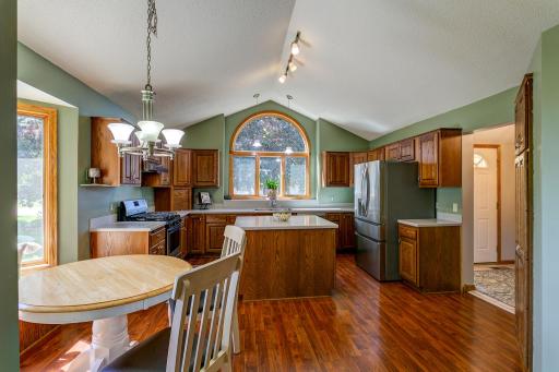 Kitchen with center island, stainless steel appliances and lots of cupboard space