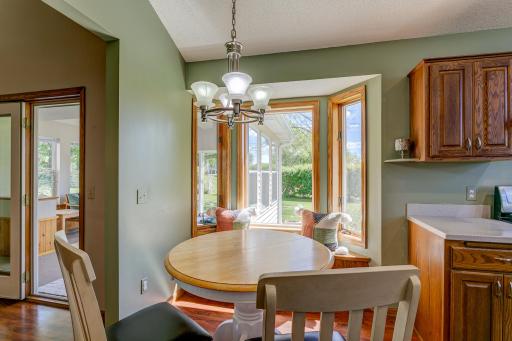 Breakfast nook with built-in bench and bay window