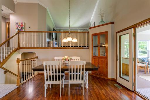 Dining room off kitchen and porch, with built-in cabinetry