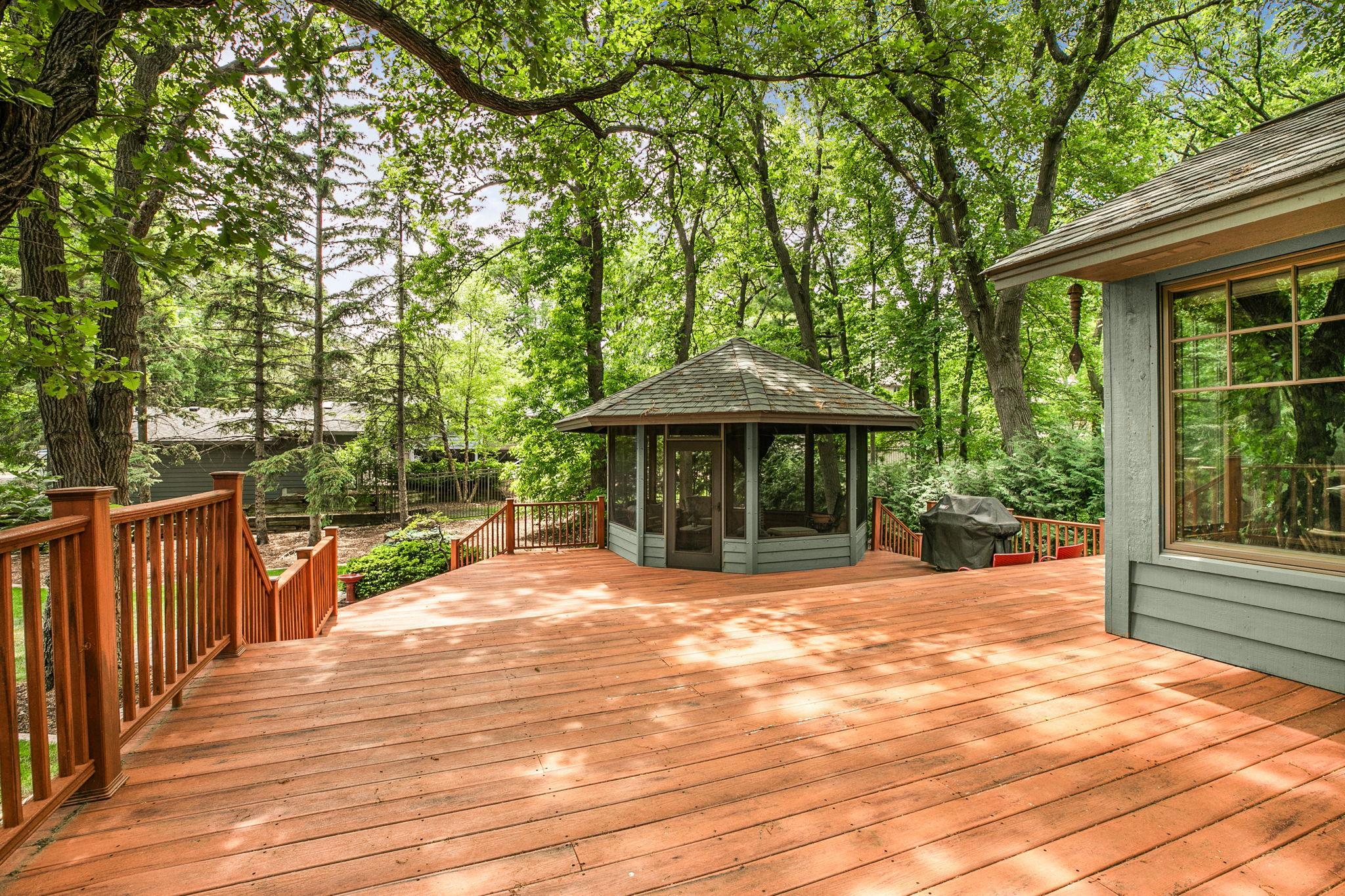 Expansive outdoor deck creates a seamless indoor-outdoor lifestyle.