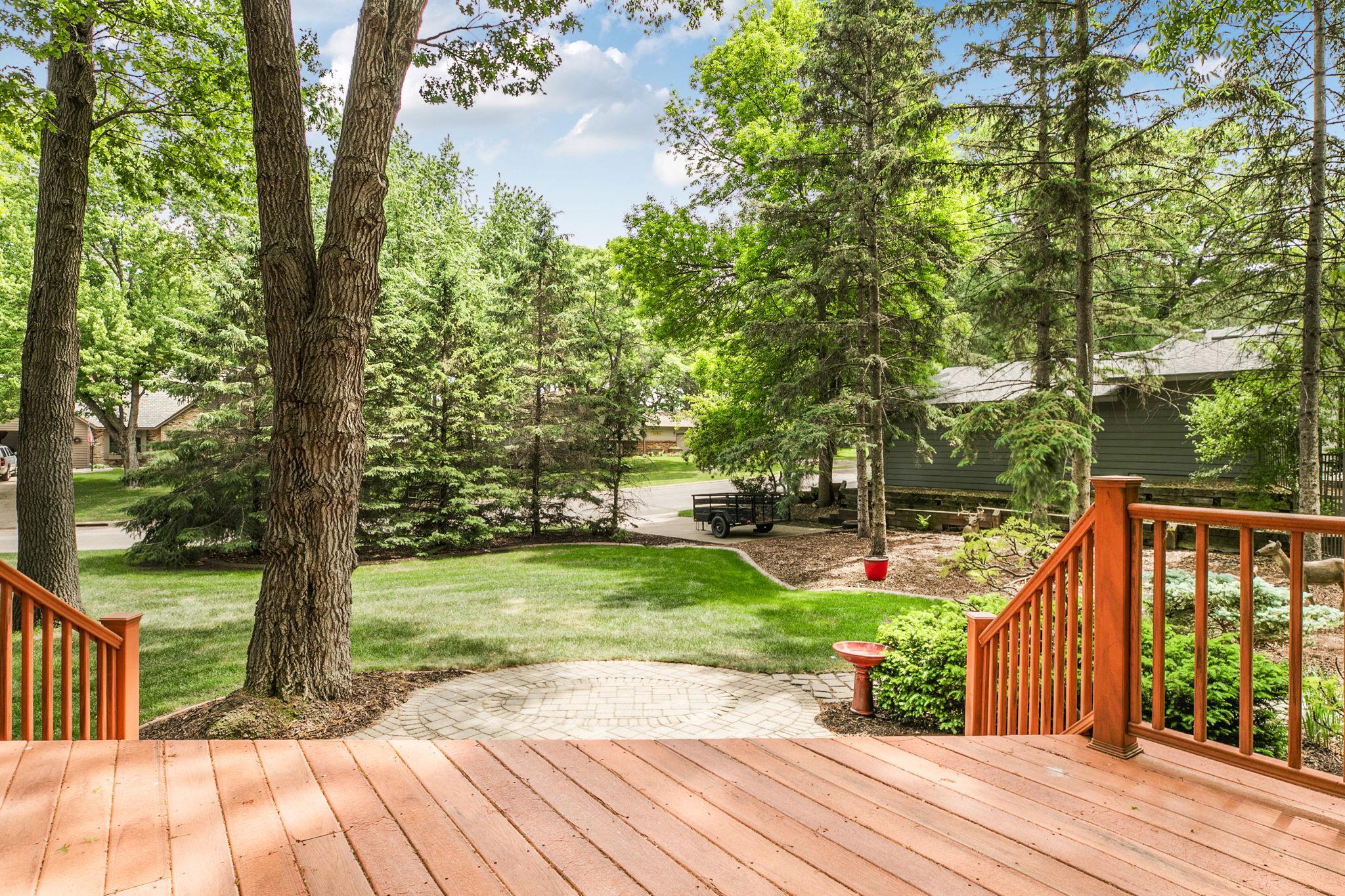 View from the deck showcases a beautiful outdoor setting.