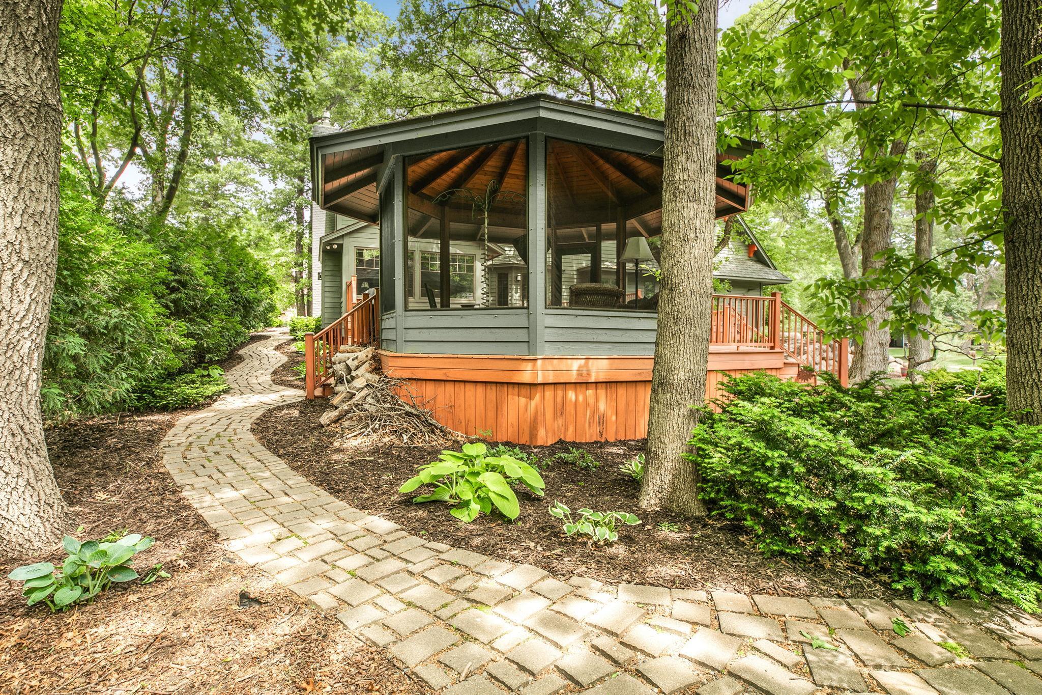 Lush perennials create a vibrant and well-established landscape.