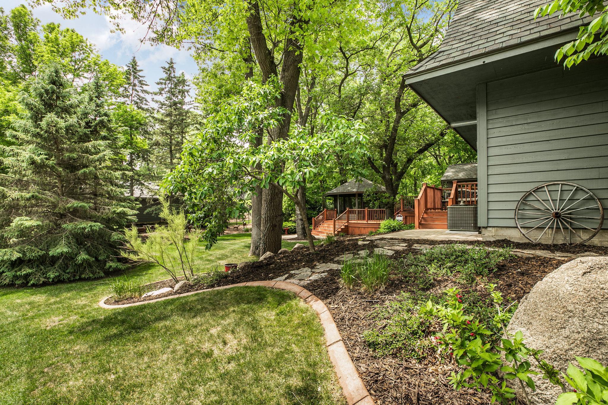 Attractive landscape design enhances both beauty and privacy.