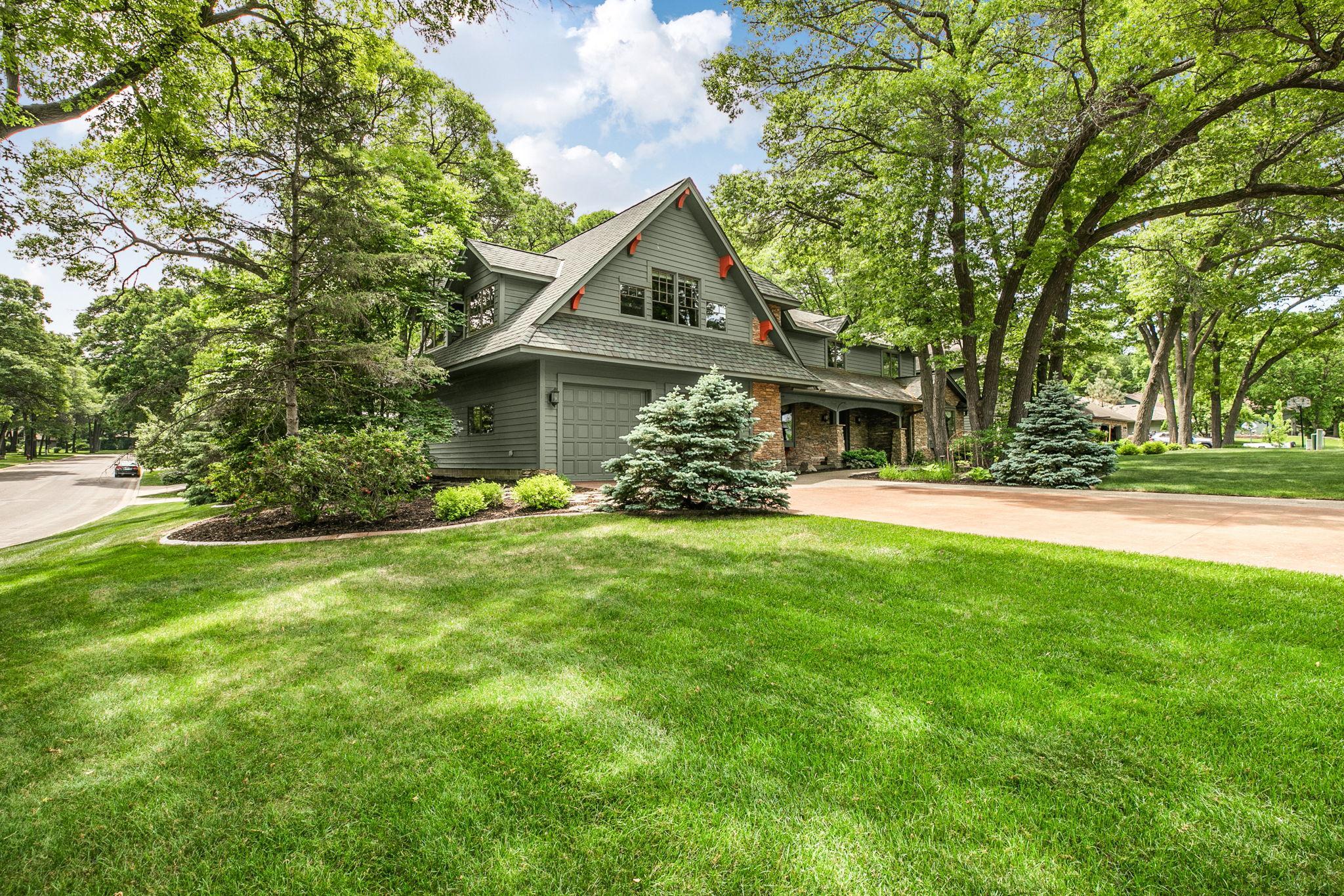 Classic front fa&ccedil;ade highlights the home&rsquo;s style and architectural detail.