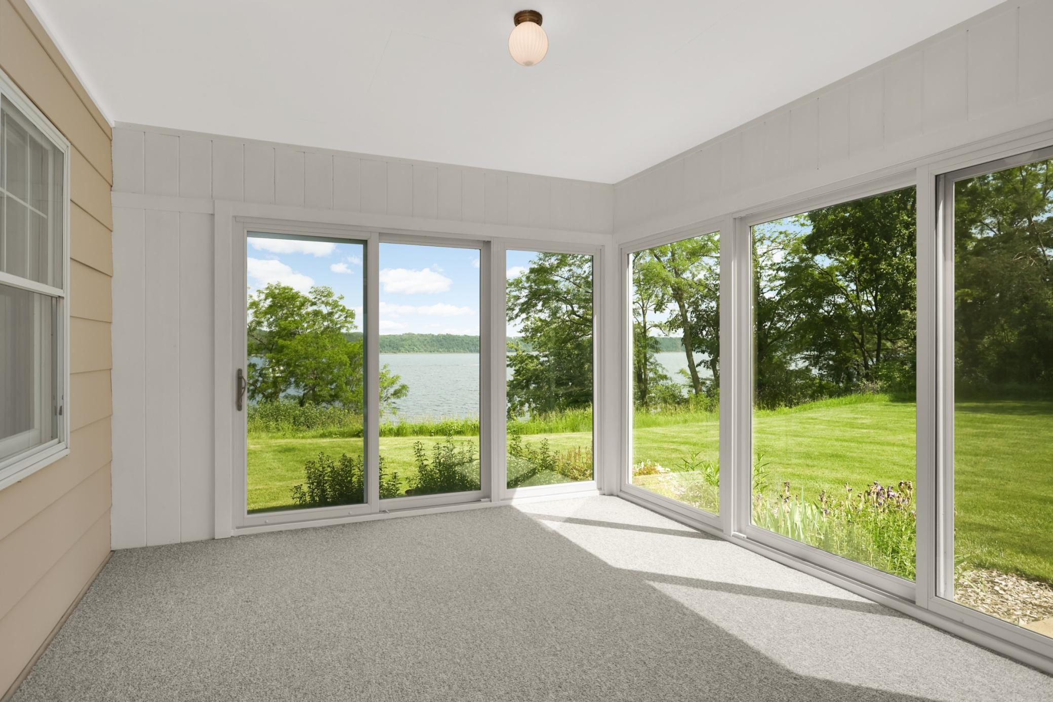 The 3-season porch offers spectacular views of the river!