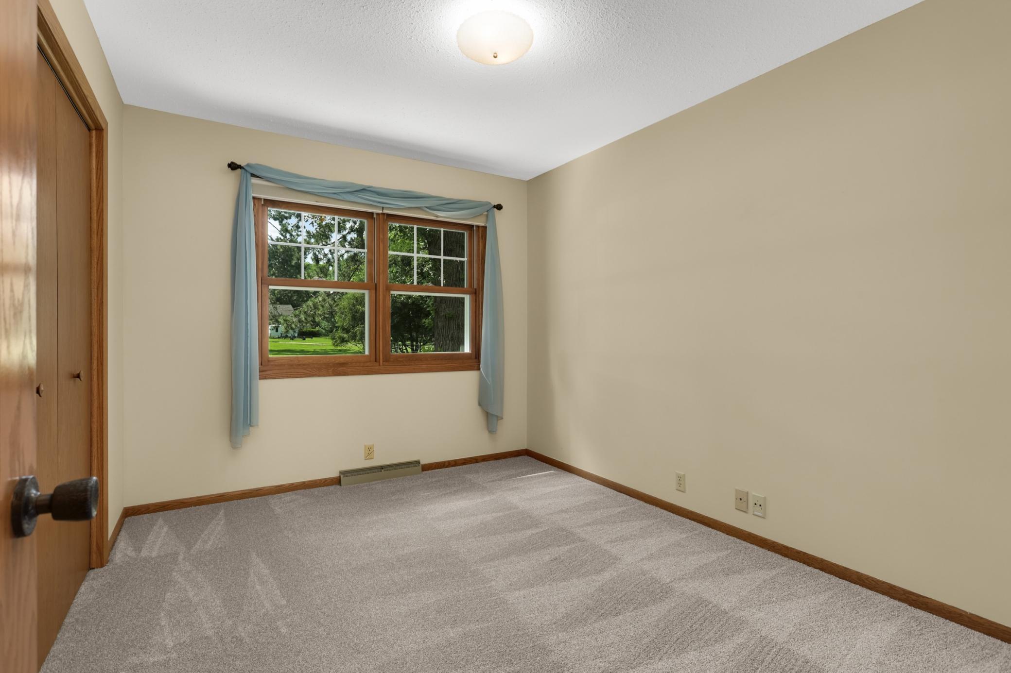 3rd main floor bedroom with new carpet