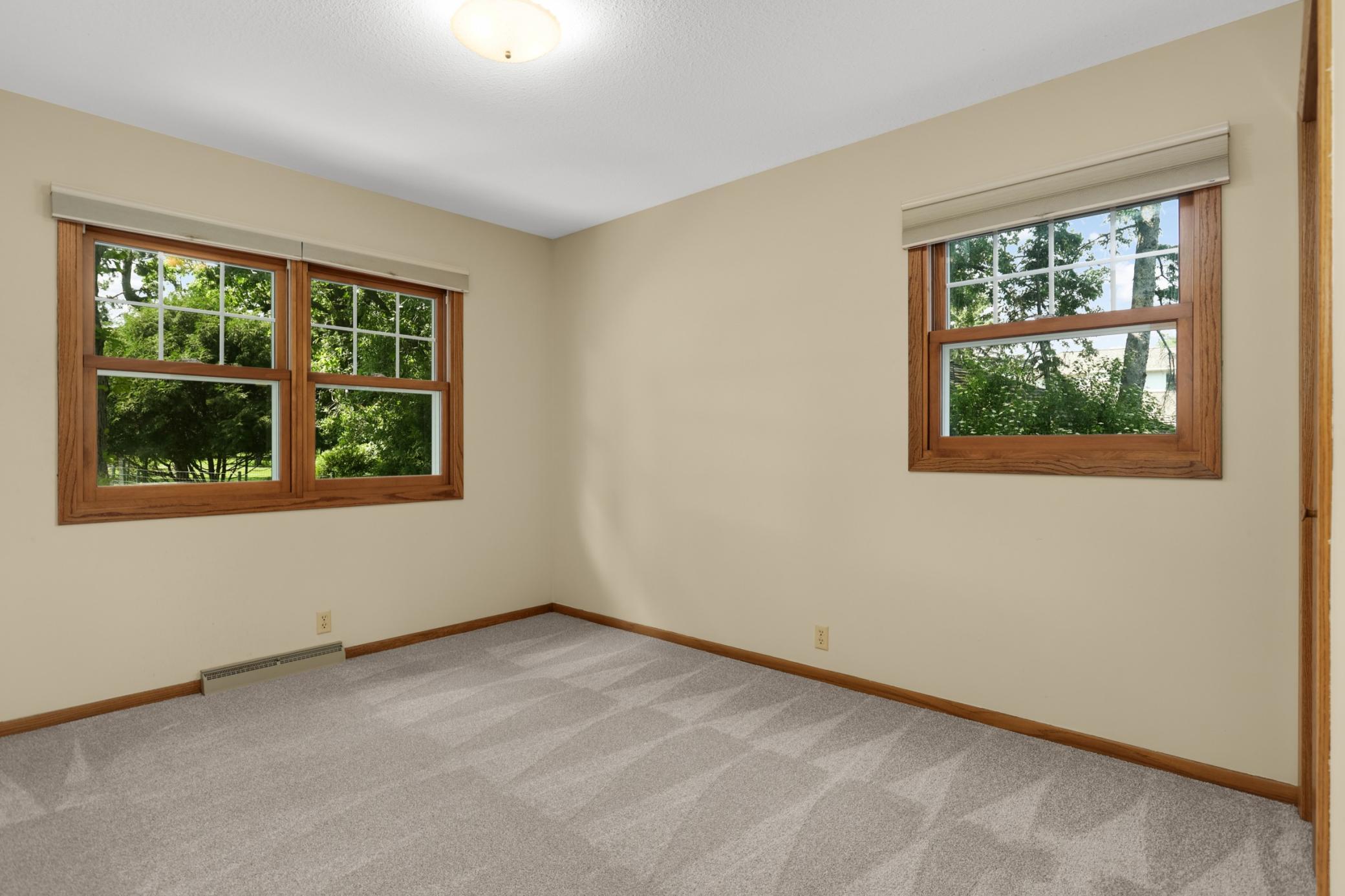 2nd main floor bedroom with new carpet.