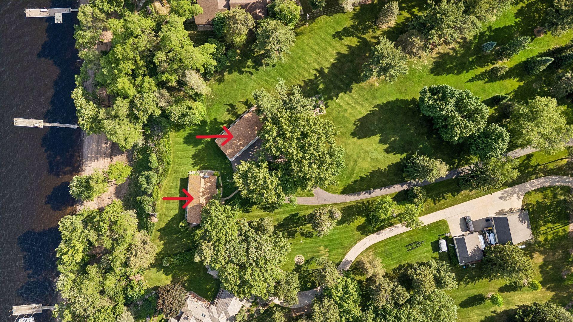 Overhead aerial showing the house, garage and the dock.