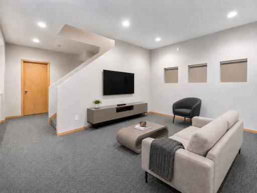 Virtually Staged lower level flex room. Ideal for family room, exercise area, and more.