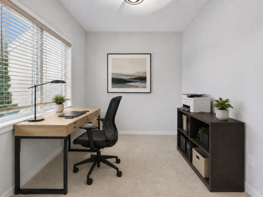 Virtually staged office. Privately tucked behind French doors the dedicated main-floor office is ideal for work-from-home.