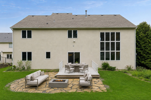 Virtually stage patio. Low maintenance composite decking and beautiful stone patio.