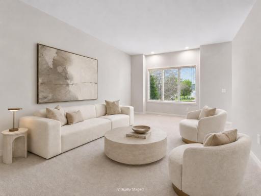Virtually staged living room. Spacious Living Room with beautiful views.