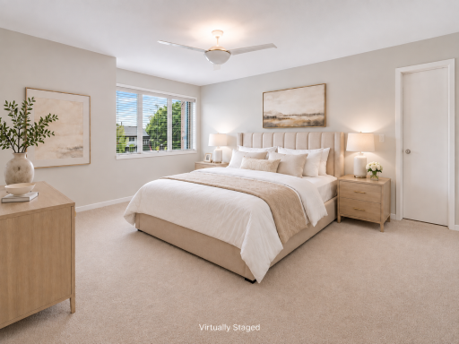 Virtually staged Primary Bedroom. Spacious primary bedroom with large walk-in closet.