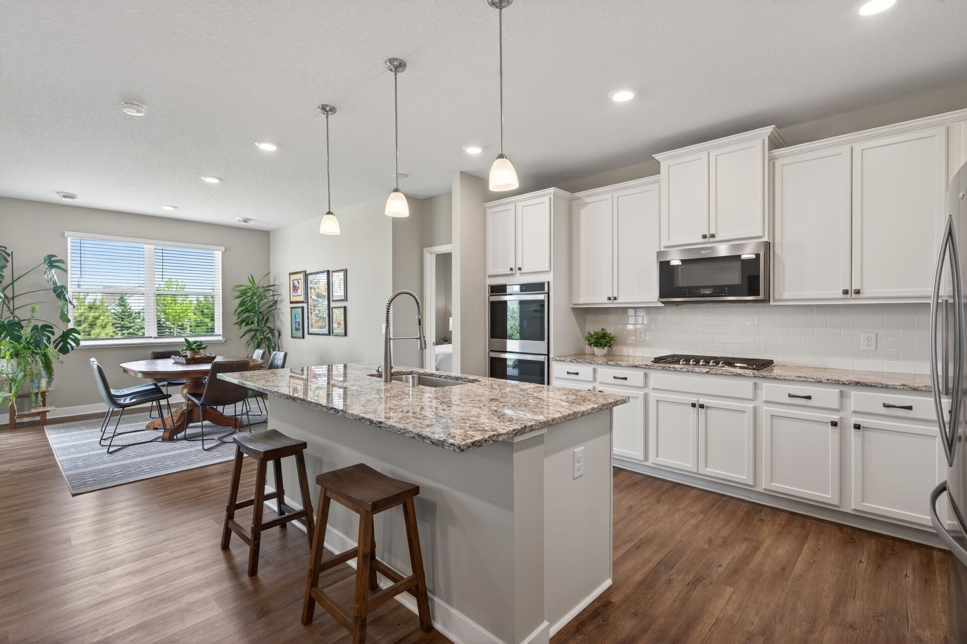 Stunning space, bright open layout that is ideal for entertaining. Large breakfast bar for casual dining and plenty of counter space for making your favorite dishes. Love the holidays again with the double ovens!
