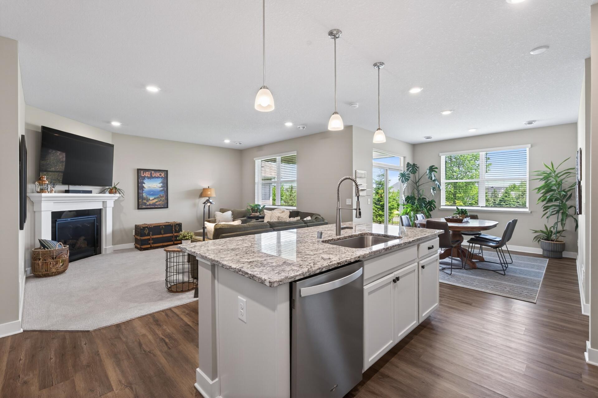 Open-concept floor plan with seamless flow between living, dining, and kitchen areas. Perfect for entertaining!