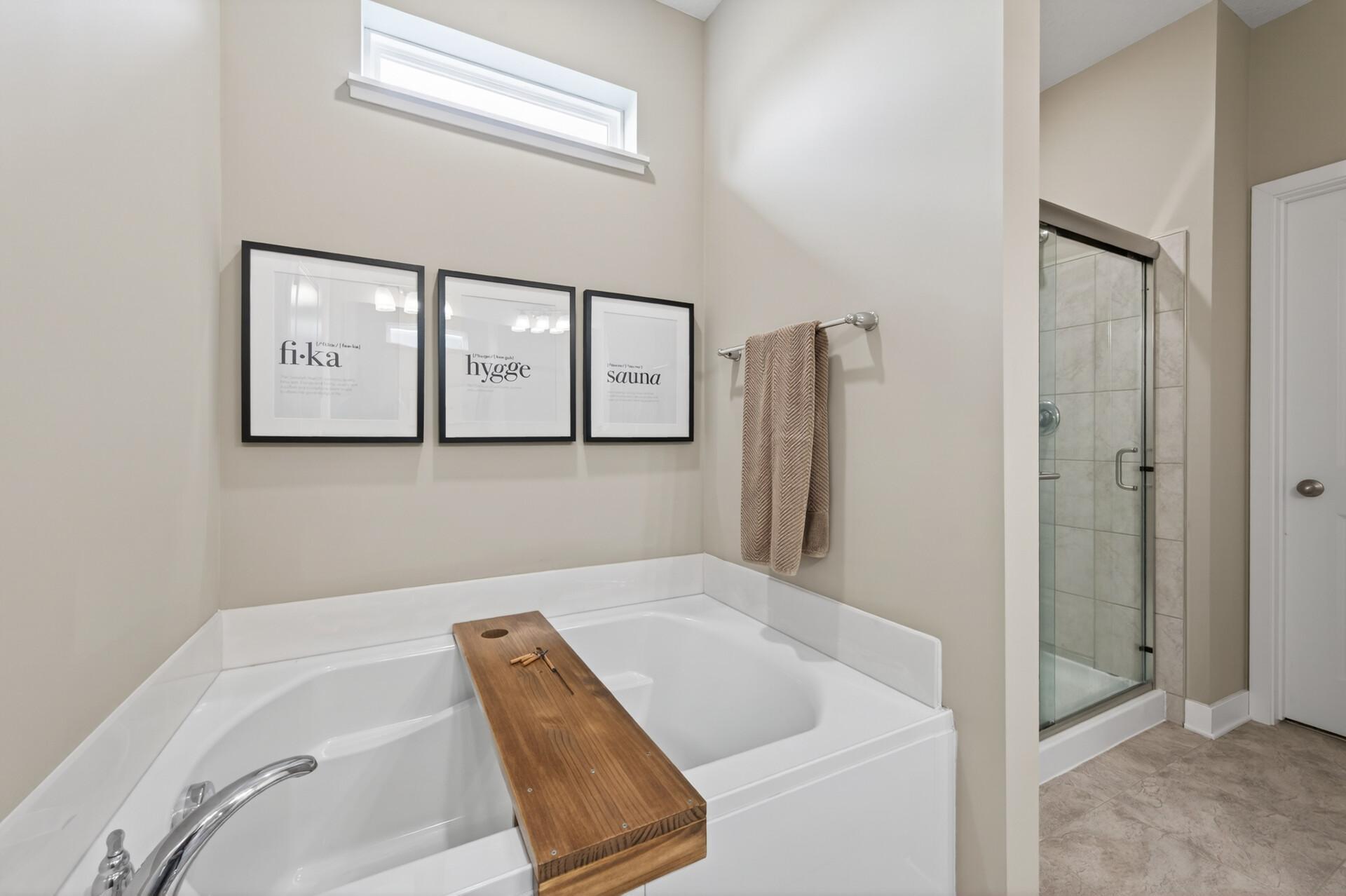 Rare find! Separate soaking tub and shower. Relax after a long day of work.