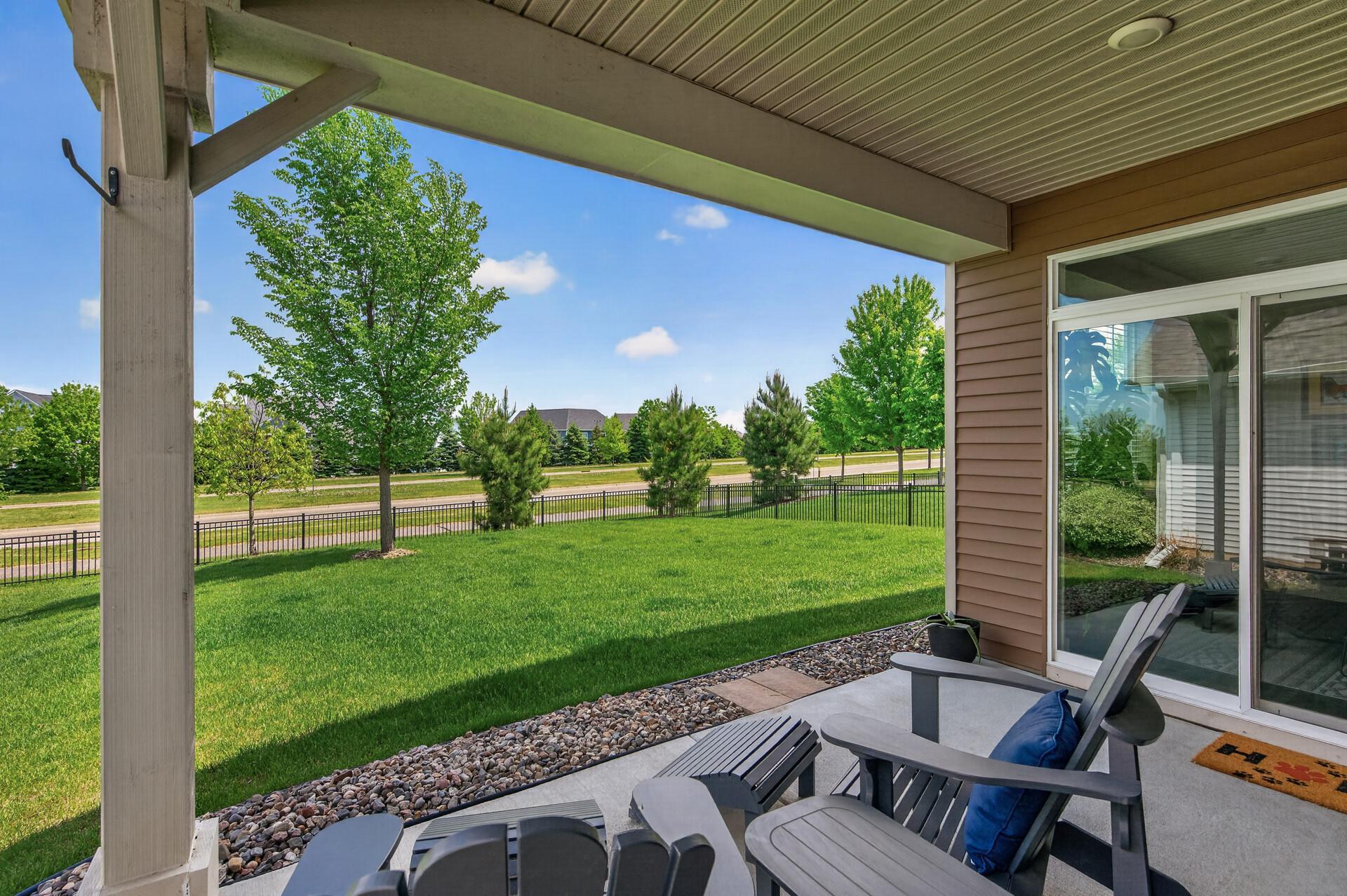 Enjoy your summer evenings on this covered patio! Perfect for grilling and entertaining! Partially fenced yard on side and back! Best part: add a fence to the South with a larger gate opening to still get your lawn mowed by the HOA!